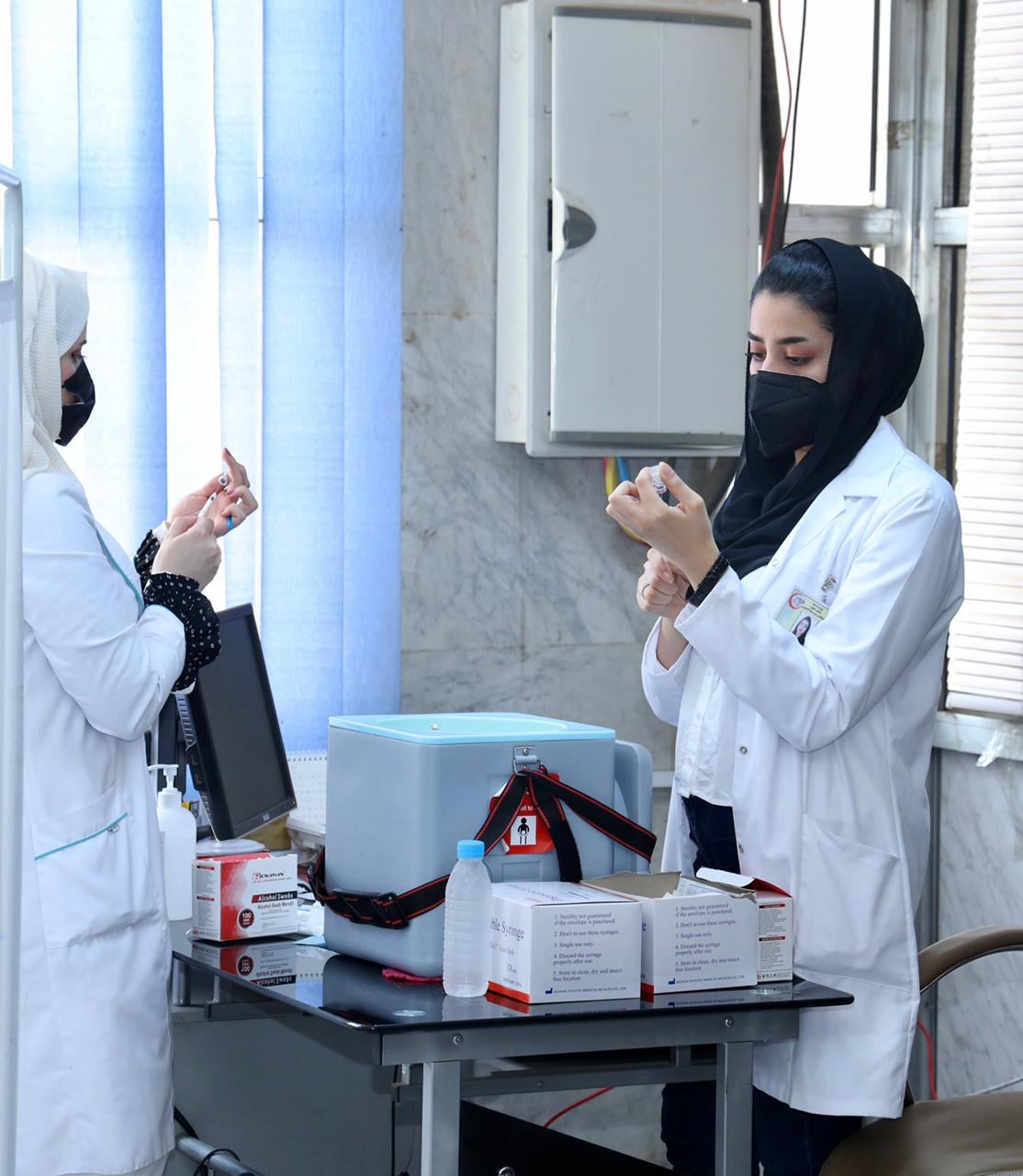 العراق يسجل اعلى معدل تلقيح يومي ضد كورونا.. والاصابات تتجاوز الـ7700 اصابة