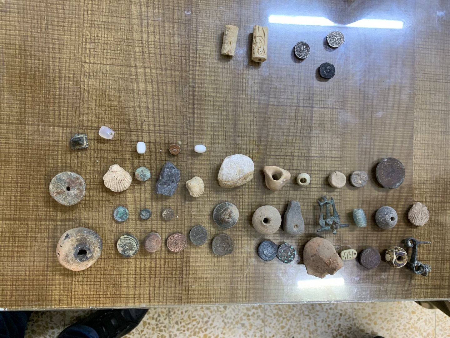 الإستخبارات العراقية تطيح بمهربي آثار ومروجي مخدرات و10 متهمين