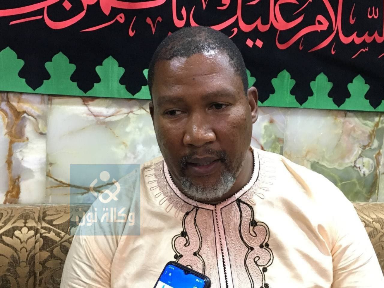 حفيد نيلسون مانديلا في كربلاء: الامام الحسين مصدر الهام لملايين الشعوب حول العالم